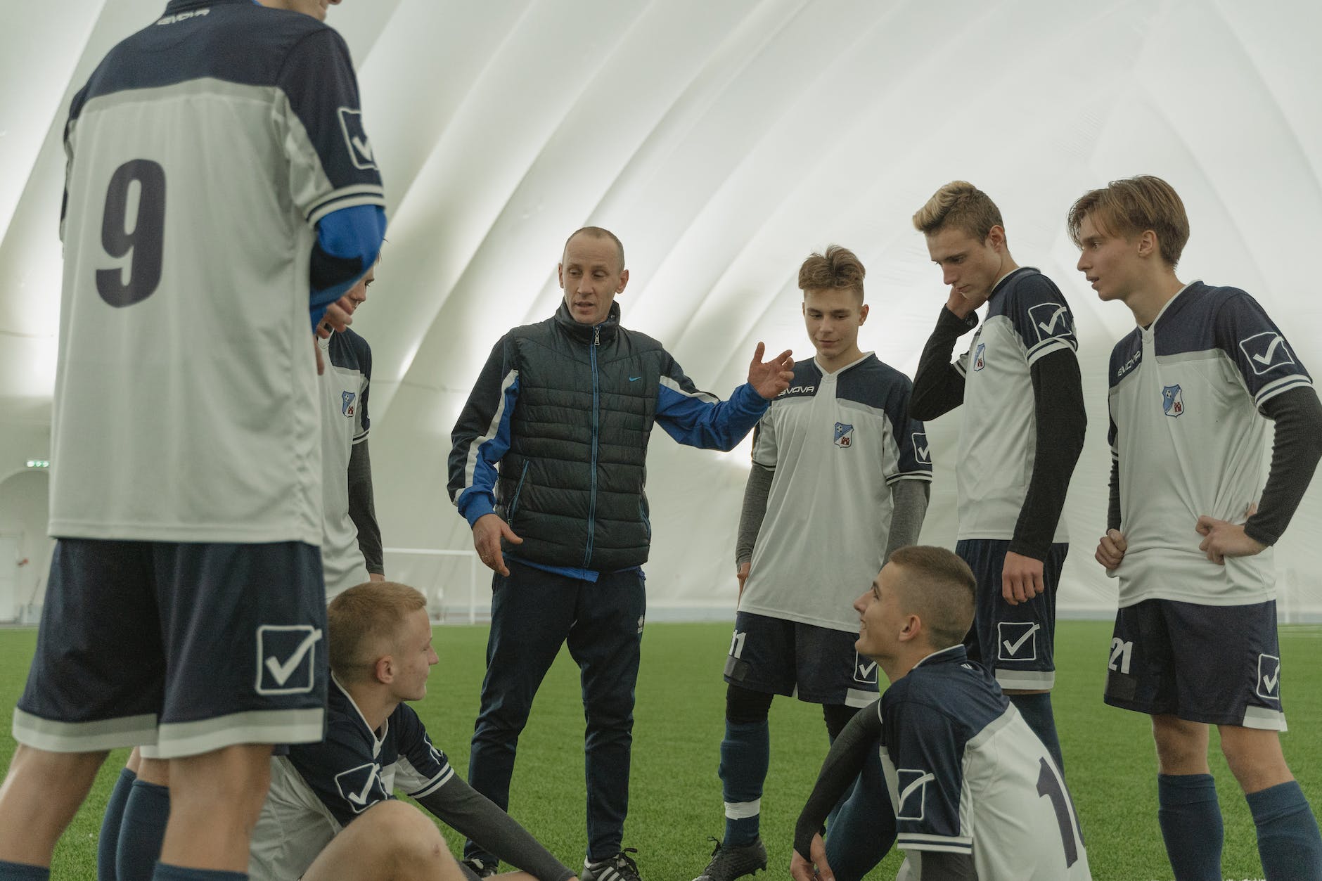 a coach talking to his team